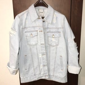 Distressed denim jacket